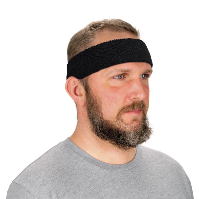 Black terry cloth headband on a model